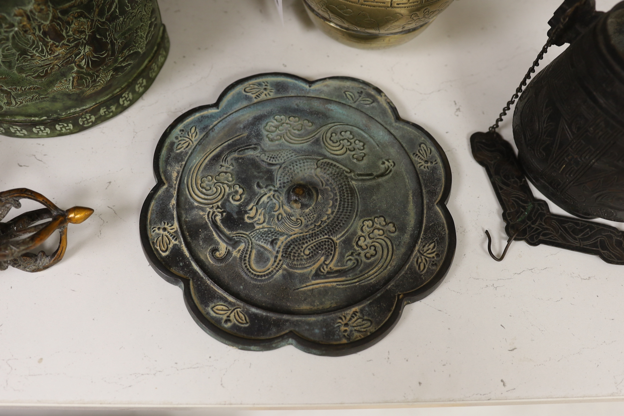 Two Chinese bronze vessels, a bronze censer, a vajra and a bronze mirror, tallest 16cm high